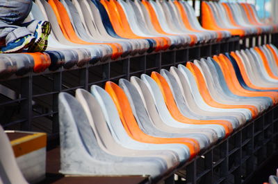 Empty seats arranged in row at stadium