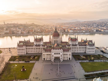 Hungarian parliament building and danube river in budapest cityscape stunning view from a drone