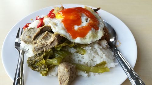 High angle view of food served in plate on table