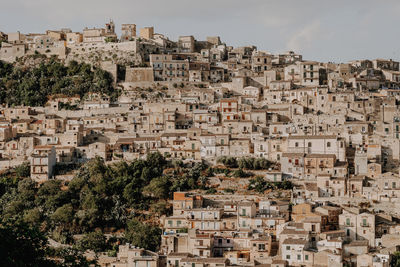 View of residential district against sky