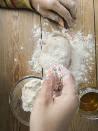 Directly above shot of person preparing food on table