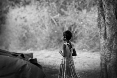 Girl standing on field