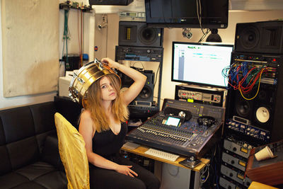 Young woman at a recording studio