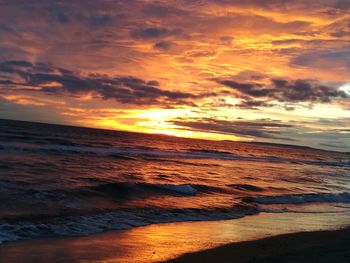 Scenic view of beach during sunset