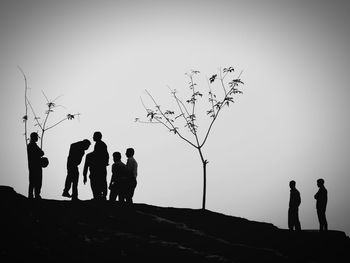 Friends standing on white background