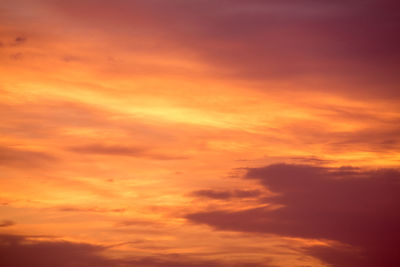 Low angle view of dramatic sky during sunset