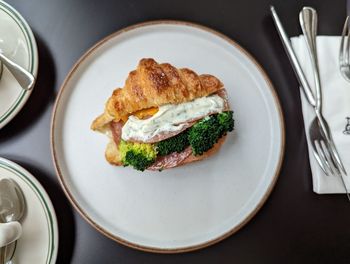 Smoked turkey croissant on a plate