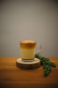 Close-up of coffee cup on table