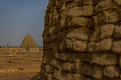 Tombs of old dongola cemetery and tombs in the north of the sudanese desert