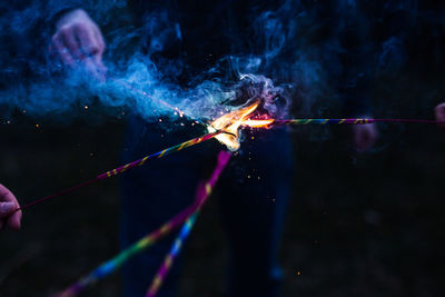 Close-up of fire crackers at night