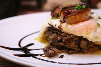 Close-up of foie gras served in plate on table