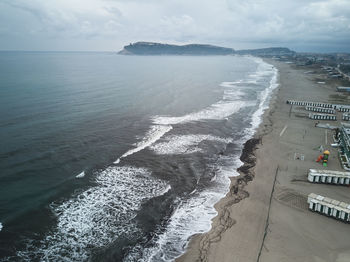 View from above of the poetto beach in the city of cagliari - winter season in a cloudy day