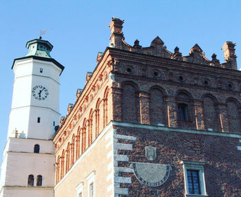 Low angle view of building against blue sky