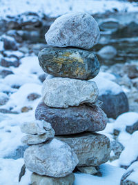 Stack of stones on snow