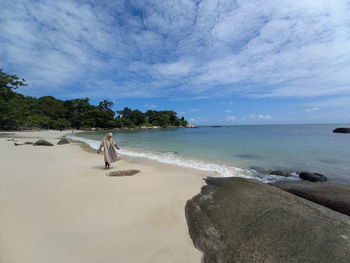 Scenic view of beach against sky