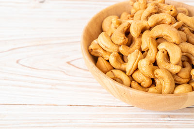 Close-up of almonds in bowl on table