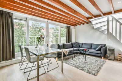 Chairs and table on sofa at home