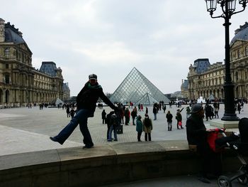 Tourists in front of building