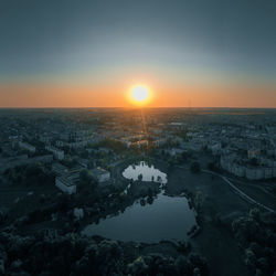 High angle view of buildings against sky during sunset