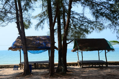 Built structure on beach against sky