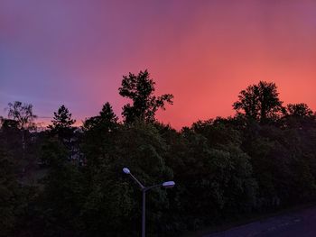 Street light against clear sky during sunset