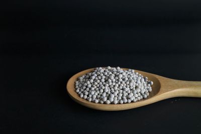 Close-up of candies against black background