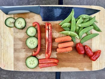 High angle view of chopped vegetables on cutting board