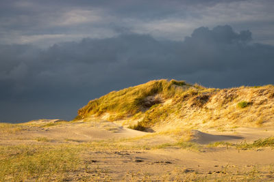 Scenic view of north swan dunes against sky