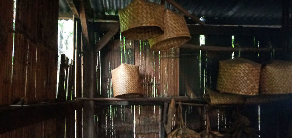 Close-up of clothes hanging in basket