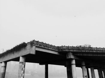 Low angle view of bridge against clear sky