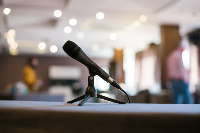 Close-up of lighting equipment on table