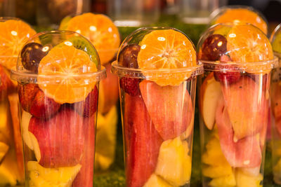 Close-up of fruits in glass jar