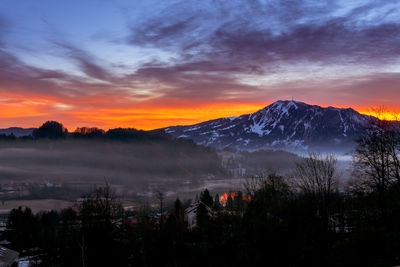 Scenic view of mountains against sky during sunset