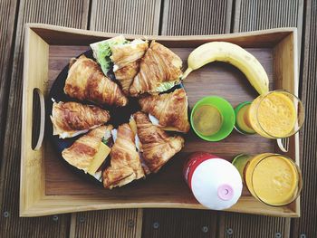 Directly above shot of breakfast served in tray on table