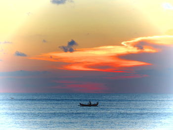 Scenic view of sunset over sea