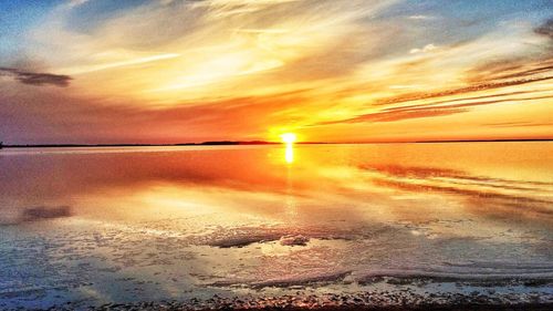 Scenic view of sea at sunset