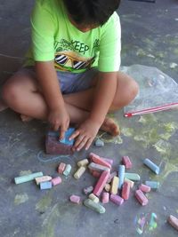 High angle view of siblings playing