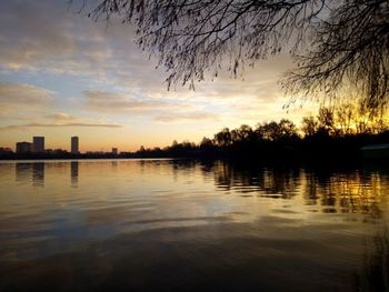 Scenic view of lake against sky during sunset