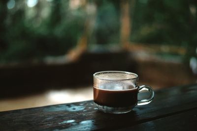 Close-up of coffee cup on table