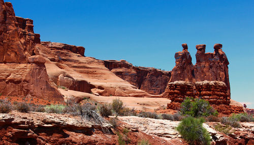 Rock formations against blue sky