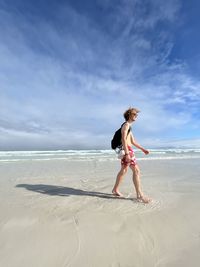 Walking at the beach in the galapagos islands.