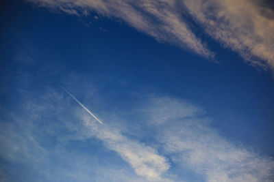 Low angle view of vapor trail in sky