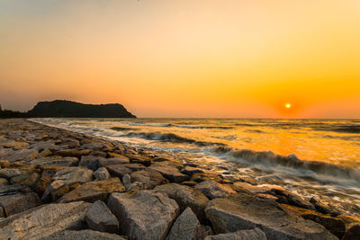 Scenic view of sea against sky during sunset