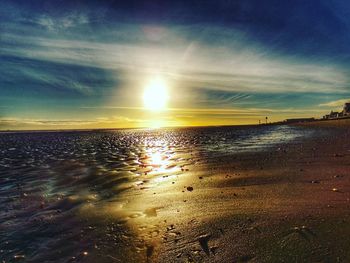 Scenic view of sea against sky at sunset