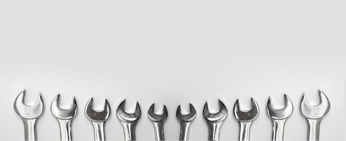 High angle view of nails against white background