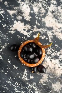 High angle view of black tea in bowl on table