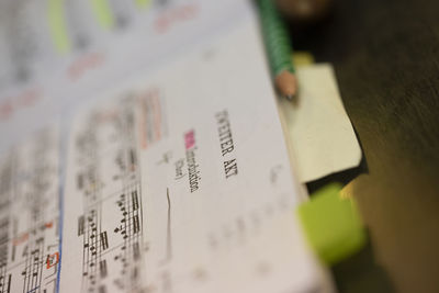 High angle view of text on book at table