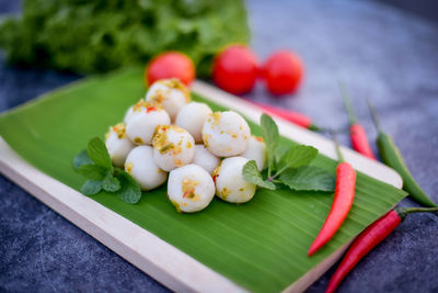 Close-up of fruits in plate on table