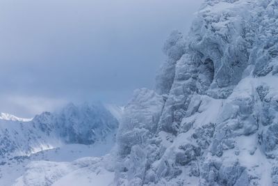 Close-up of snow against sky