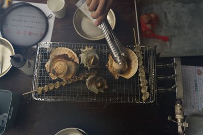 High angle view of man preparing food